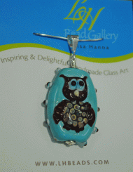 Owl on aqua bead